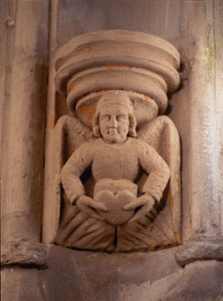 9-11-angel-holding-heart-250x338.